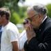 An audience member of the Arborcrest Memorial Day Observance participates in a prayer on Sunday, May 26. Daniel Brenner I AnnArbor.com